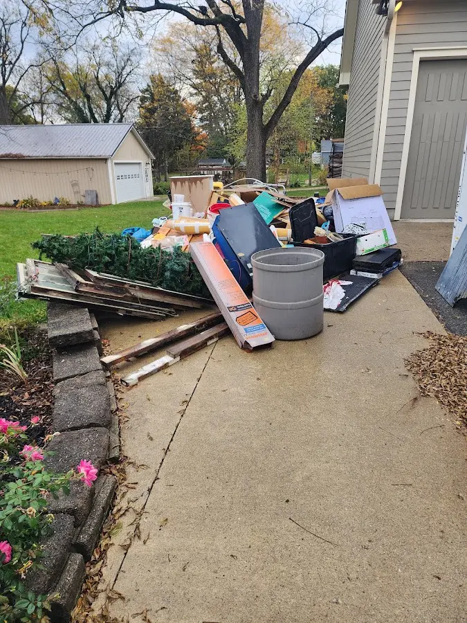 Dumpster being loaded with debris for 30 Yard Dumpster Rental in Ventnor City